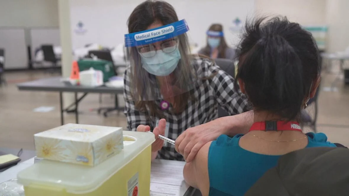 Alberta's immunization plan needs to bring vaccine to communities facing barriers, doctors say